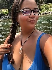 A woman with an extra layer of fat is masturbating.