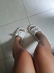 Skinny MILF is fingering her pussy and showing her boobs