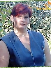 A hot woman in her prime enjoys herself while performing in front of the camera.